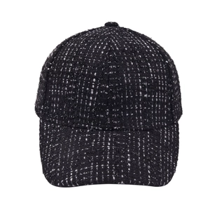 Classic black and white tweed baseball cap with textured weave for casual street style