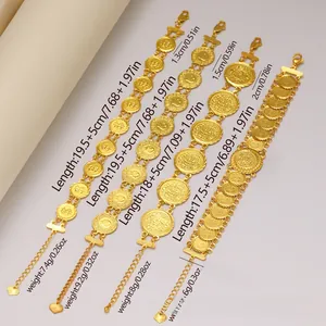 Detailed view of four 24k gold-plated coin bracelets with lobster clasp and heart charm