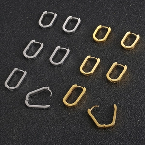 Polished U-shaped geometric hoop earrings in gold and silver finish for women