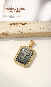 Detail of gold-plated rectangular pendant with carved angel shell and zircon frame