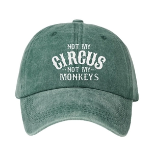 Washed dark green baseball cap featuring NOT MY CIRCUS NOT MY MONKEYS printed text