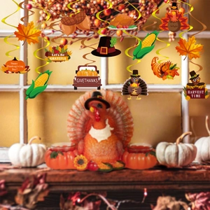 Close-up of Thanksgiving hanging swirls with turkey, pumpkin and harvest motifs