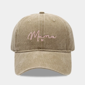 Close-up of pink Mama embroidery on vintage washed khaki cotton baseball cap
