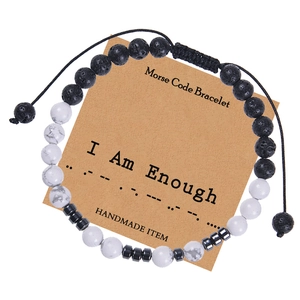 Macro detail of Morse Code bracelet with natural white turquoise and I Am Enough card