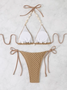 Detail showing shell decorations and textured fabric on khaki halter bikini set