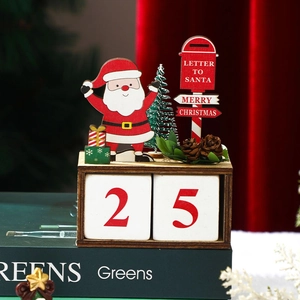 Wooden Christmas countdown calendar with Santa, mailbox, and pine cones on a dark background