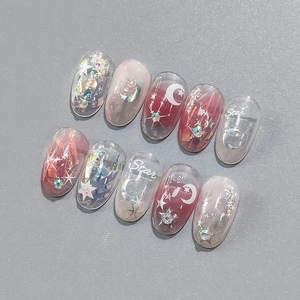 5D star moon press-on nail kit with pink gradient finish and sparkling rhinestones