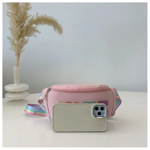 Pink sequin kids waist bag with rainbow strap and phone for size reference