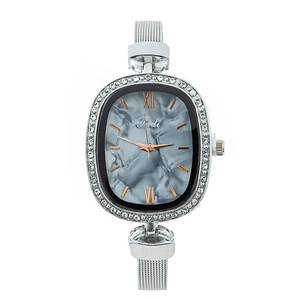 Elegant ladies quartz watch with rhinestone bezel, marble dial, and silver mesh strap