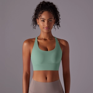 Texture dettagliata del reggiseno sportivo verde menta con incrocio posteriore e scollo a U