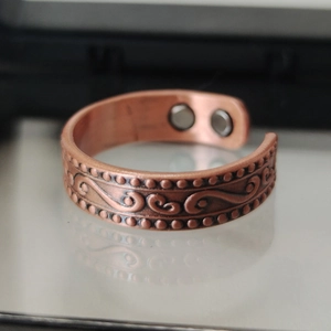 Red copper magnetic therapy ring with wave pattern and adjustable open band design