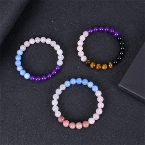 Three beaded crystal fertility bracelets in blue aquamarine and mahogany jasper stones
