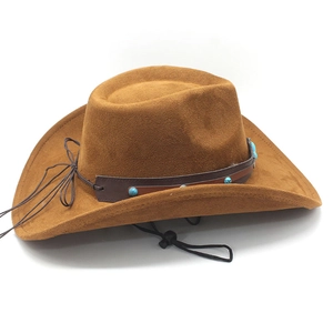 Detail of brown suede cowboy hat featuring turquoise beads on a leather hat band
