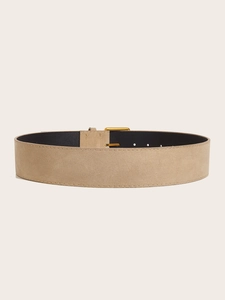 Detail of a wide khaki suede belt featuring a square gold metal buckle and stitching