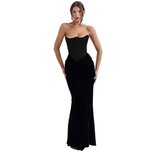 Detailed macro view showing the velvet texture and corset boning of this black evening dress