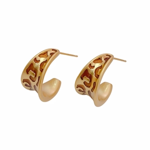 Vintage gold-toned C-shaped hoop earrings featuring a brown leopard print enamel finish