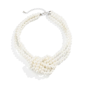 Detail of multi-layer faux pearl necklace with knotted design and silver clasp