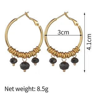 14k gold-plated U-shaped hoop earrings with black multifaceted beads and golden spacers