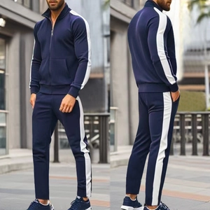 Detail of navy blue men's tracksuit featuring white side stripes and stand collar design