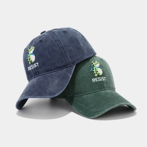 Vintage washed cotton baseball cap with frog resist embroidery in navy and green