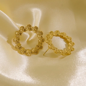 Elegant 14K gold plated stainless steel flower wreath stud earrings on silk background