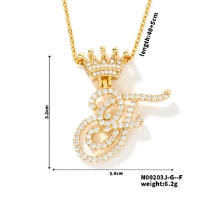 Detailed view of gold crown letter F pendant with dimensions 3.2x2.9cm and 45cm chain length