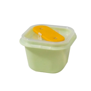 Mini plastic popsicle mold with light green base and transparent lid with yellow latch
