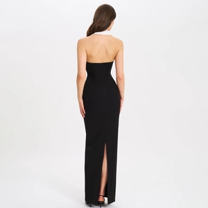 Elegant black backless maxi dress with halter neck and slit detail for women