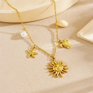 Gold stainless steel necklace with sun face, starfish, turtle, pearl, and shell pendants