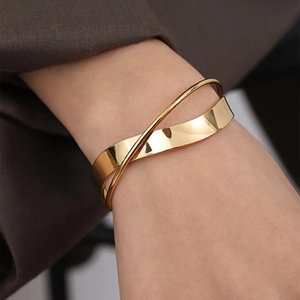 Minimalist 18k gold plated stainless steel layered cross bangle with polished finish