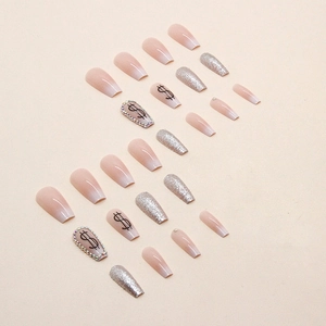 Pink gradient ballet press-on nails with silver glitter and dollar sign rhinestone art