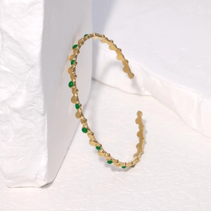 Fashionable 18k gold plated stainless steel open bangle with green enamel dots