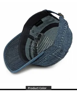 Detail view of denim flat top military cap interior with 100% cotton label and adjustable buckle