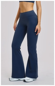 Detail view of high-waisted navy blue flared yoga pants showing fabric elasticity