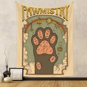 Detail view of Pawmistry cat tapestry hanging in a cozy home decor setting