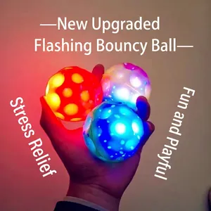 Three LED light up high bounce moon balls with textured surface for sensory play and stress relief