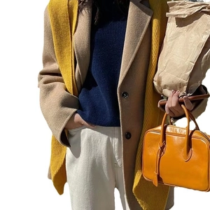 Winter set with ginger yellow knit scarf and khaki wool coat with leather handbag