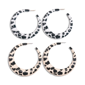 Fashionable C-shaped cow print resin earrings in black, white, and beige patterns