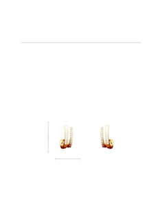 Detailed view of J-shaped gold-plated earrings with white enamel and cubic zirconia stones