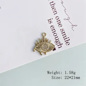 Close-up of gold evil eye heart pendant with dimensions 22x21mm and 1.58g weight