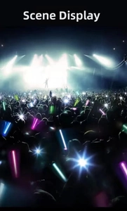 Vibrant scene of crowd using multi-colored LED glow sticks at a concert event