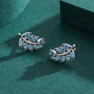 S925 sterling silver leaf stud earrings with turquoise stones on dark green background