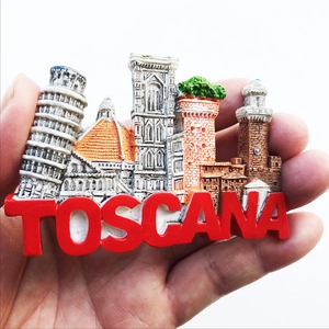 Handheld detail of a 3D resin Italy Toscana fridge magnet with Leaning Tower of Pisa