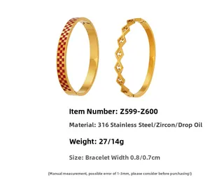 Detail view of 316 stainless steel gold bracelets with red checkerboard and zircon accents