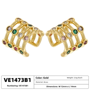 Detail view of multi-layer gold brass ear cuff with colorful cubic zirconia stars