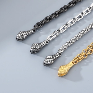Detail of snake head clasp and various chain styles in four metallic color finishes