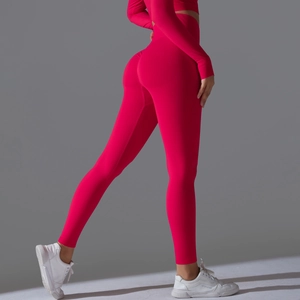Detailed back view of high waist seamless pink yoga set showing butt lift effect
