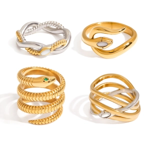 Minimalist snake-shaped stainless steel rings with green zircon and mother of pearl accents