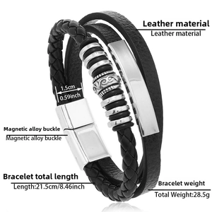 Macro view of multi-layer braided black leather bracelet with vintage silver alloy magnetic clasp