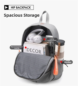 Detailed interior of gray backpack featuring padded laptop sleeve and large main compartment